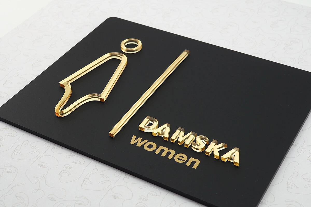 Czarna matowa tabliczka z oznakowaniem - toaleta damska piktogram złote lustro