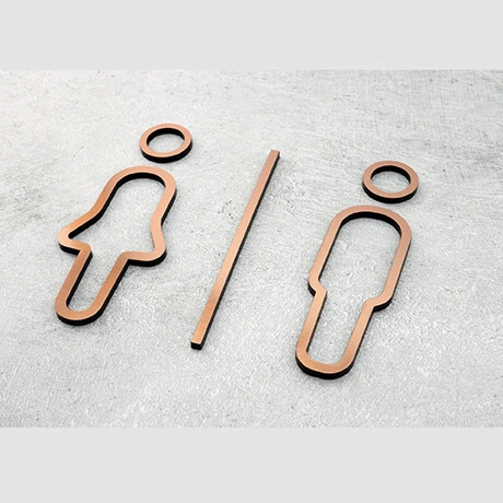 Toaleta damsko-męska piktogram kolor miedziany